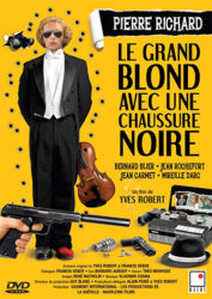 le grand blond avec une chaussure noire a 177x250